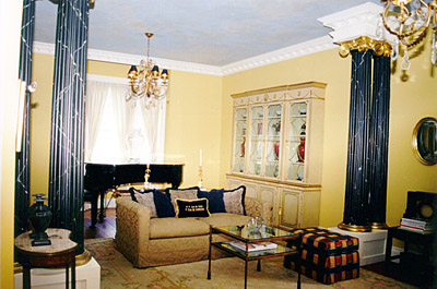 FORMAL LIVING AND DINING ROOM FEATURES 10' CEILINGS, FAUX MARBLE COLUMNS AND WILL ACCOMODATE A GRAND PIANO. 